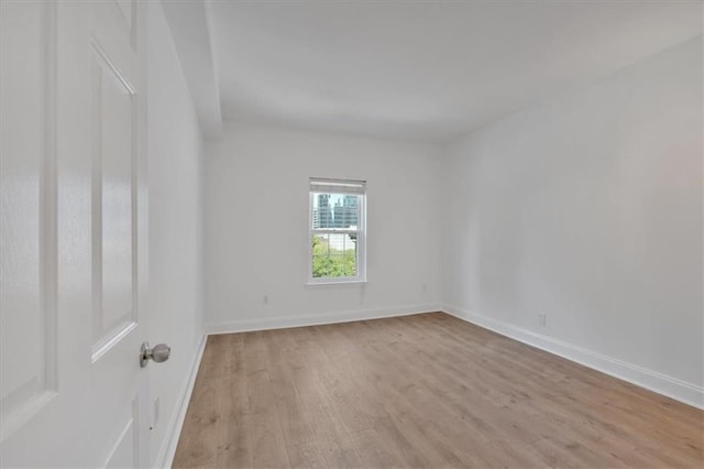 1075 Peachtree Walk NE Unit A421, Atlanta, GA 30309 - spare room featuring light wood-style flooring and baseboards