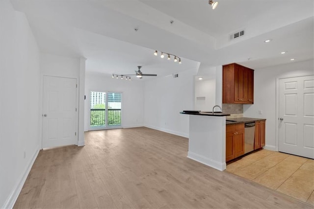 1075 Peachtree Walk NE Unit A421, Atlanta, GA 30309 - kitchen featuring dishwasher, a ceiling fan, light wood-type flooring, dark countertops, and recessed lighting