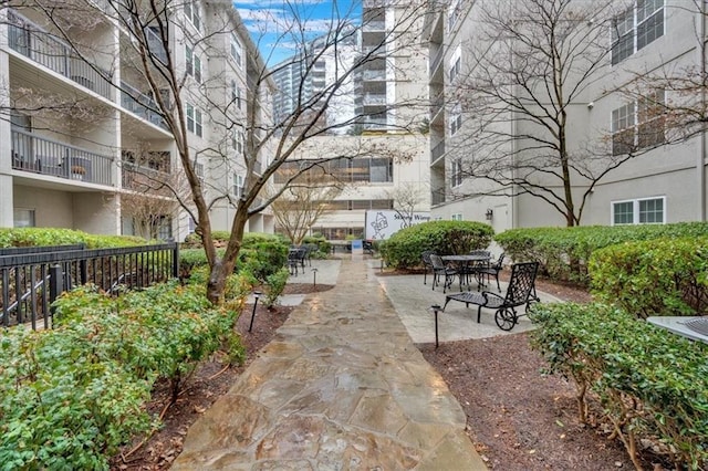 1075 Peachtree Walk NE Unit A421, Atlanta, GA 30309 - view of community featuring a patio