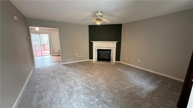 home theater featuring dark hardwood / wood-style floors and ceiling fan