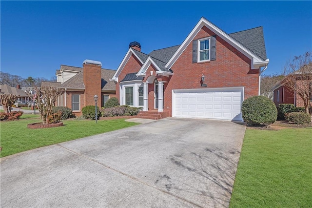 traditional-style home with a garage, a shingled roof, concrete driveway, a front lawn, and brick siding