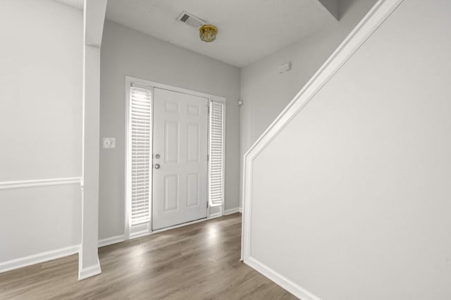 foyer featuring hardwood / wood-style floors