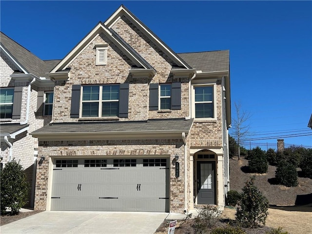 view of front of house with driveway and an attached garage