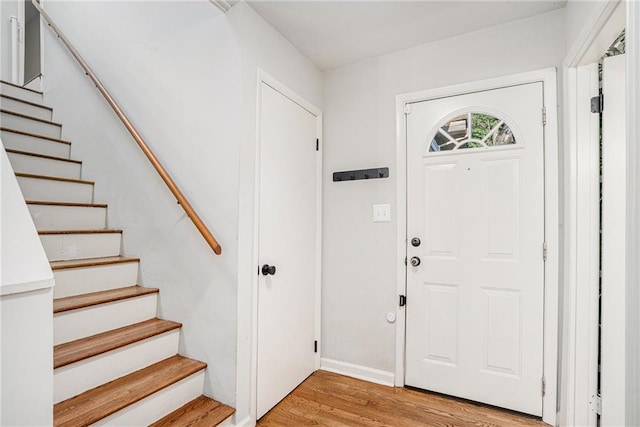 foyer with light hardwood / wood-style floors