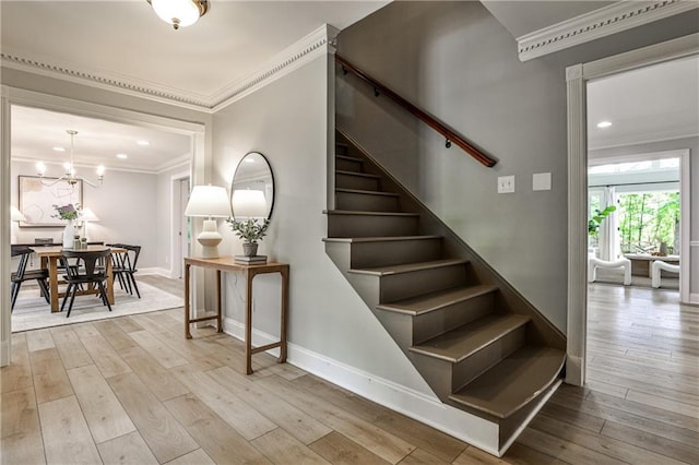 270 Hollyridge Way, Roswell, GA 30076 - staircase with crown molding, hardwood / wood-style flooring, a chandelier, and recessed lighting