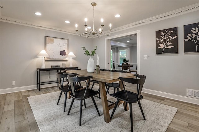 270 Hollyridge Way, Roswell, GA 30076 - dining room with crown molding, a chandelier, wood finished floors, and recessed lighting