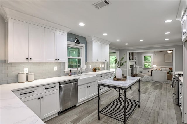 270 Hollyridge Way, Roswell, GA 30076 - kitchen featuring stainless steel dishwasher, crown molding, white cabinets, backsplash, and light wood-type flooring