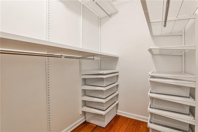 270 Hollyridge Way, Roswell, GA 30076 - spacious closet featuring wood finished floors
