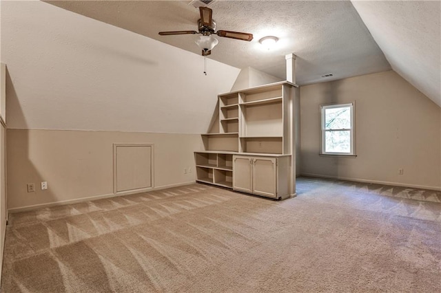 270 Hollyridge Way, Roswell, GA 30076 - bonus room featuring vaulted ceiling, light colored carpet, a textured ceiling, and ceiling fan