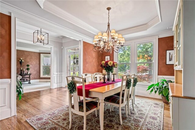 sunroom / solarium featuring beam ceiling, a wealth of natural light, and coffered ceiling