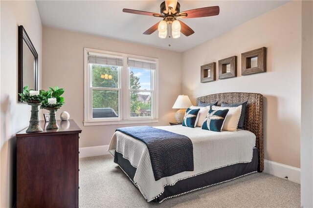 living area featuring a high end fireplace, ornamental molding, recessed lighting, and beam ceiling