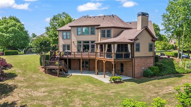 craftsman-style home featuring stone siding, a front lawn, and brick siding