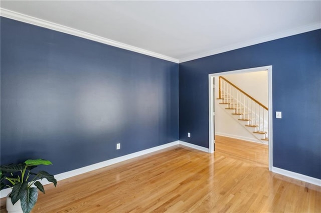 2350 Twelvestones Dr, Roswell, GA 30076 - unfurnished room featuring baseboards, light wood-style floors, stairway, and ornamental molding