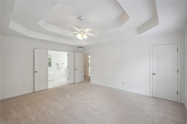2350 Twelvestones Dr, Roswell, GA 30076 - unfurnished bedroom with ornamental molding, a raised ceiling, carpet, connected bathroom, and baseboards