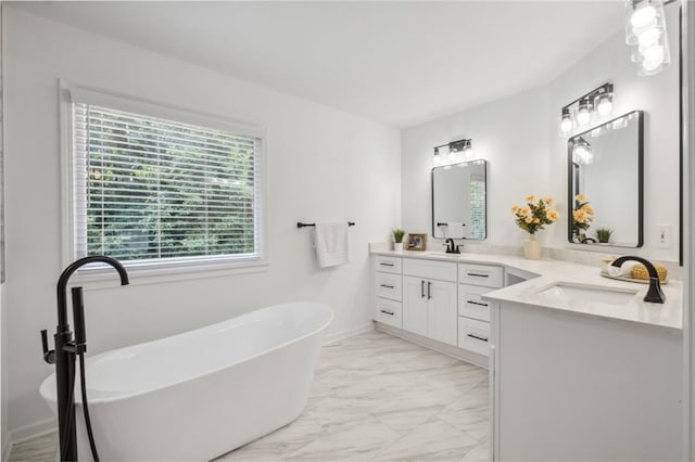 2350 Twelvestones Dr, Roswell, GA 30076 - full bathroom with marble finish flooring, vanity, a soaking tub, and baseboards