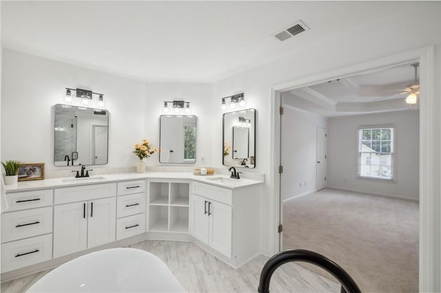 2350 Twelvestones Dr, Roswell, GA 30076 - full bath with ceiling fan, double vanity, a freestanding bath, a shower with door, and baseboards