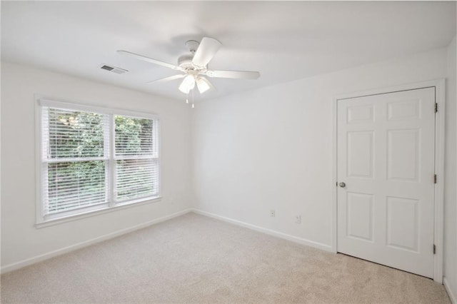 2350 Twelvestones Dr, Roswell, GA 30076 - unfurnished room featuring light carpet, baseboards, and a ceiling fan