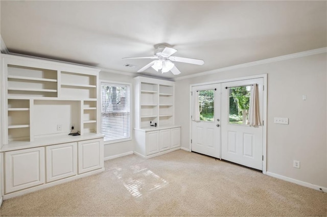2350 Twelvestones Dr, Roswell, GA 30076 - spare room featuring crown molding, light carpet, baseboards, and ceiling fan