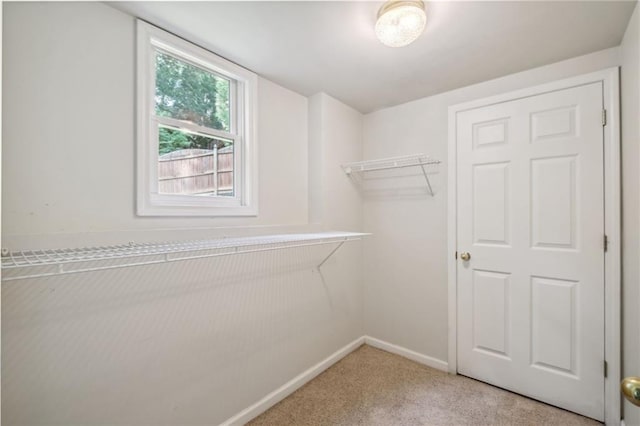 2350 Twelvestones Dr, Roswell, GA 30076 - walk in closet featuring carpet flooring