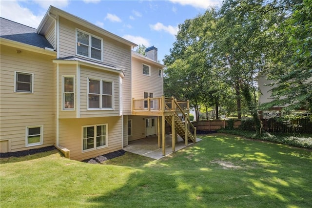2350 Twelvestones Dr, Roswell, GA 30076 - back of house with stairs, a patio, a chimney, and a wooden deck