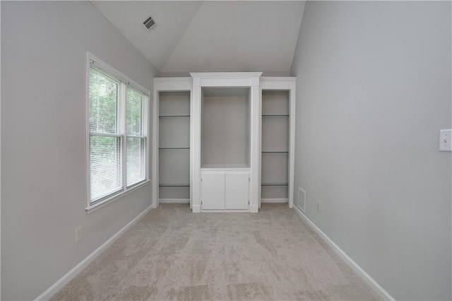 655 Golden Meadows Ln, Suwanee, GA 30024 - unfurnished bedroom with lofted ceiling and light carpet