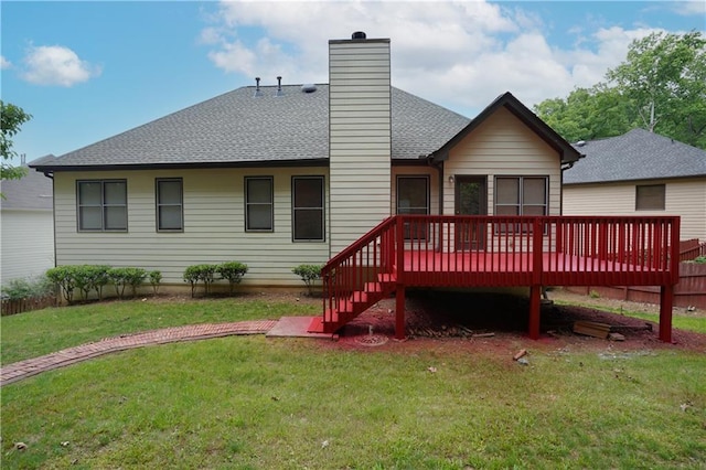 655 Golden Meadows Ln, Suwanee, GA 30024 - rear view of property with a wooden deck, a yard, roof with shingles, and a chimney