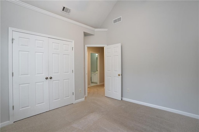 655 Golden Meadows Ln, Suwanee, GA 30024 - unfurnished bedroom with carpet, a closet, high vaulted ceiling, and ornamental molding