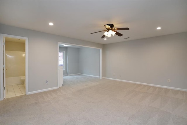 655 Golden Meadows Ln, Suwanee, GA 30024 - unfurnished room featuring light carpet, a ceiling fan, and recessed lighting