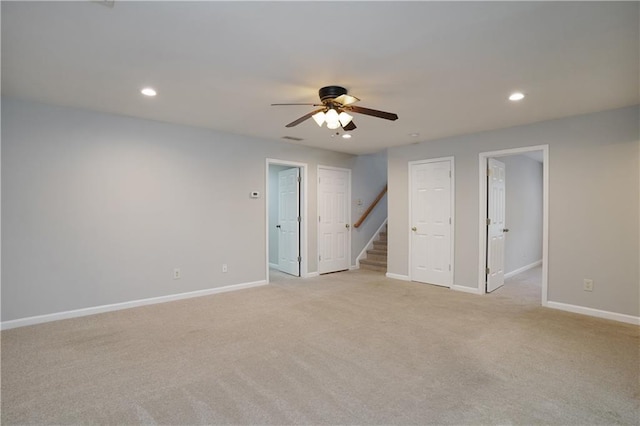 655 Golden Meadows Ln, Suwanee, GA 30024 - spare room featuring ceiling fan, light carpet, and recessed lighting