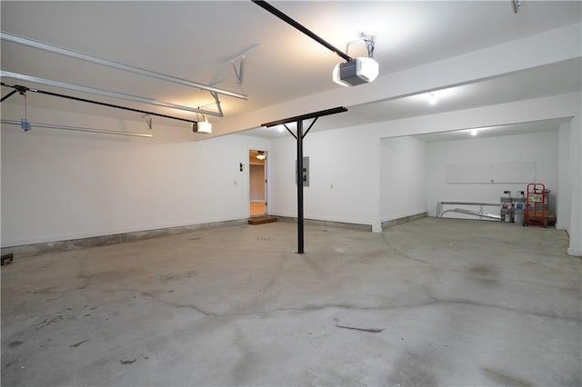 655 Golden Meadows Ln, Suwanee, GA 30024 - garage featuring a garage door opener and electric panel