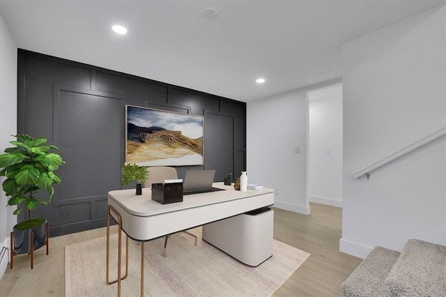 home office featuring light hardwood / wood-style flooring