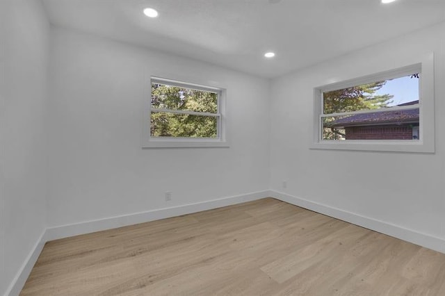 empty room with light wood-type flooring