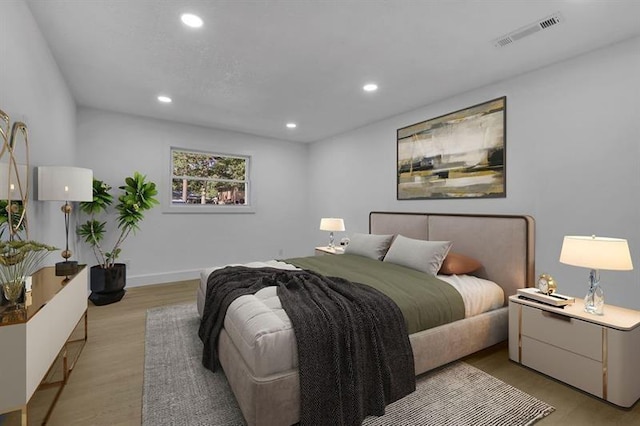 bedroom with light hardwood / wood-style flooring