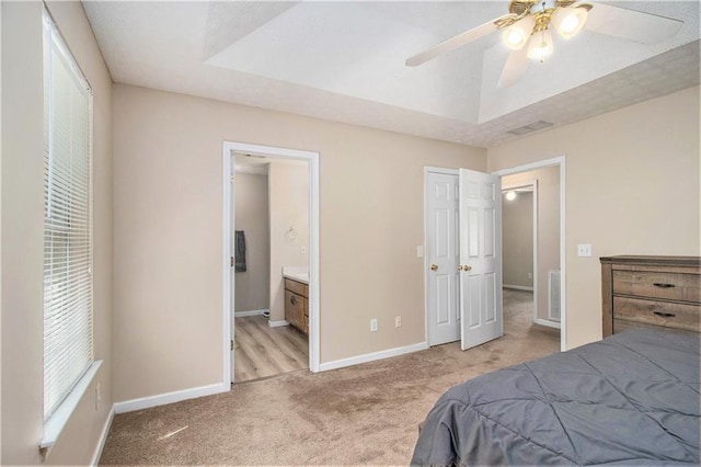60 Cypress Dr, Covington, GA 30016 - bedroom featuring light carpet, ceiling fan, and connected bathroom