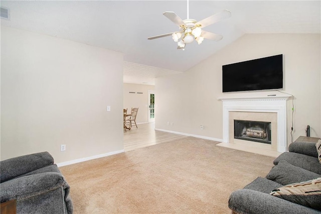 60 Cypress Dr, Covington, GA 30016 - carpeted living area with a ceiling fan, vaulted ceiling, and a fireplace