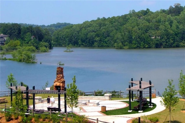 view of water feature featuring a forest view