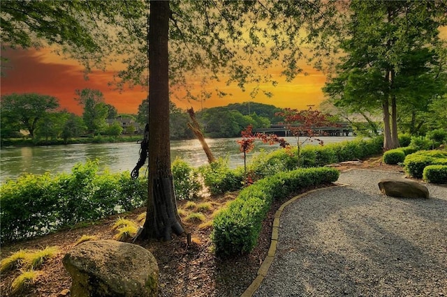 view of home's community featuring a water view