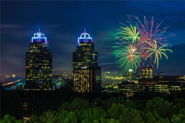 318 Sandy Springs Cir Unit 260, Sandy Springs, GA 30328 - view of city featuring a view of city lights