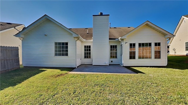 145 Charleston Pl, Covington, GA 30016 - rear view of house featuring a patio and a chimney