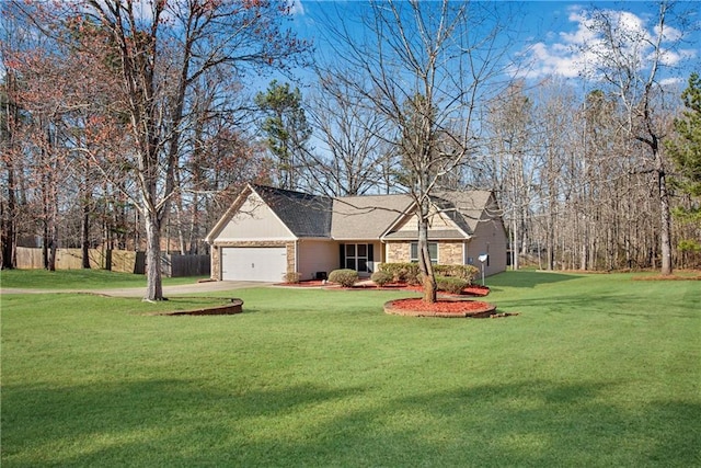 view of front of property featuring a garage, driveway, and a front yard