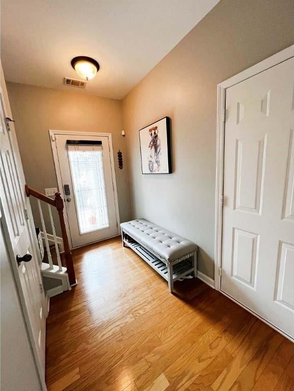 entryway featuring wood-type flooring