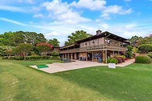 68 Montre Sq NW, Atlanta, GA 30327 - rear view of house featuring a lawn and a patio area