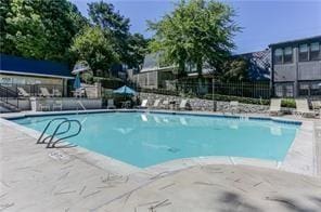 68 Montre Sq NW, Atlanta, GA 30327 - view of swimming pool featuring a patio