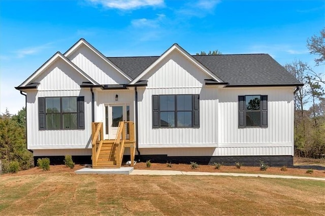 81 Bridgemill Dr, Douglasville, GA 30134 - modern farmhouse style home with a front yard and roof with shingles