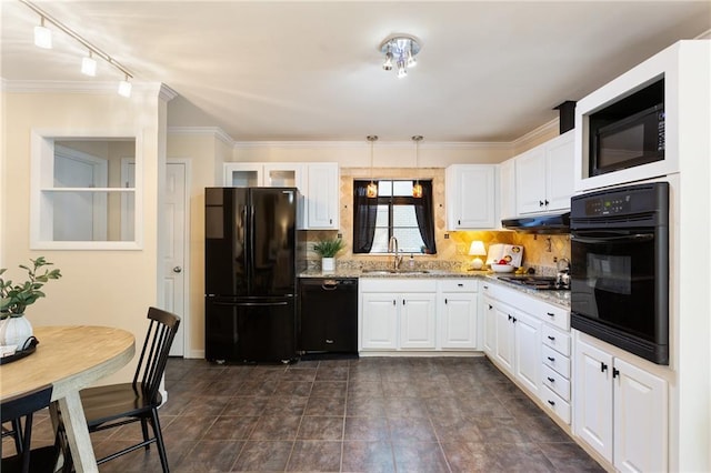 kitchen featuring white cabinetry, light stone countertops, and black appliances