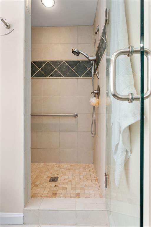 bathroom with an enclosed shower