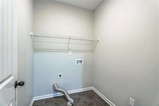 clothes washing area with hookup for a washing machine, laundry area, electric dryer hookup, and baseboards