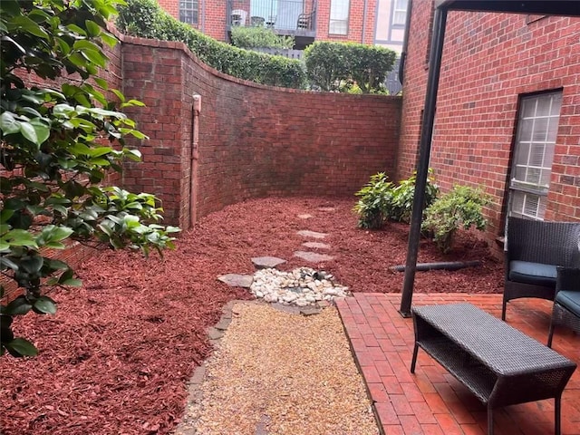 6851 Roswell Rd Unit J1, Atlanta, GA 30328 - view of yard featuring a patio