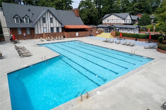 6851 Roswell Rd Unit J1, Atlanta, GA 30328 - community pool with a patio area