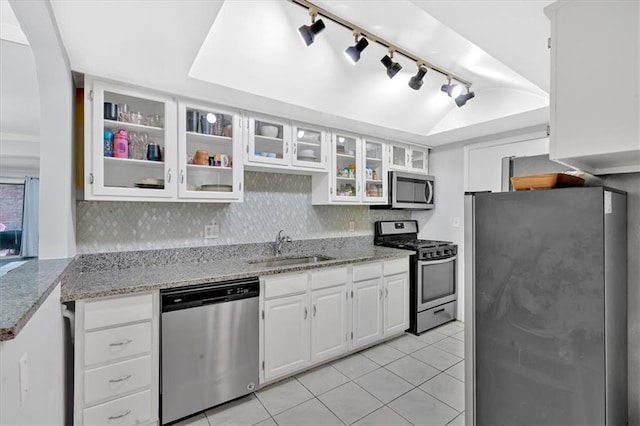6851 Roswell Rd Unit J1, Atlanta, GA 30328 - kitchen with appliances with stainless steel finishes, a sink, track lighting, white cabinets, and light tile patterned flooring